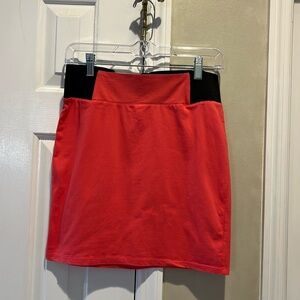 2/$15 Coral stretchy skirt by Xhilaration. Size M.